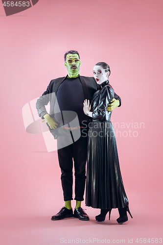 Image of Halloween Family. Happy couple in Halloween Costume and Makeup