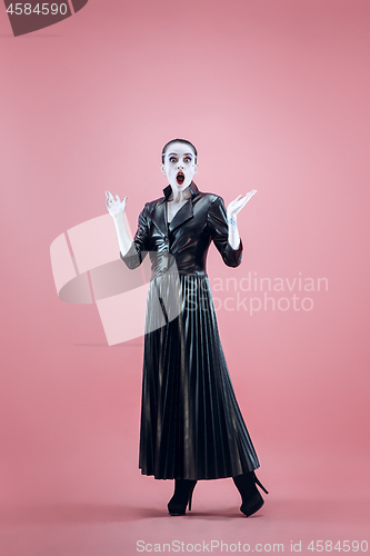 Image of Halloween. Beautiful woman with bright black halloween makeup, black and white