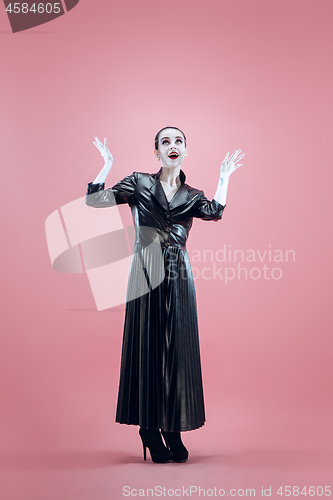 Image of Halloween. Beautiful woman with bright black halloween makeup, black and white