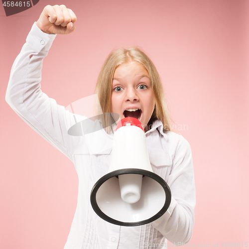 Image of The little girl making announcement with megaphone