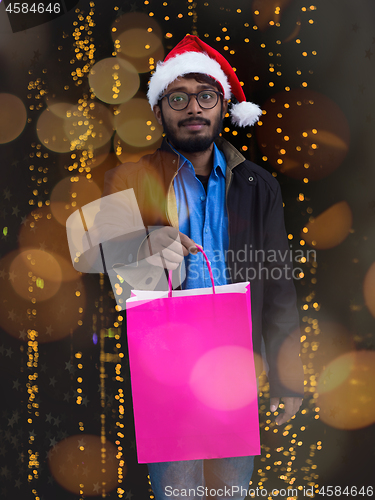 Image of Indian Santa with shopping bags