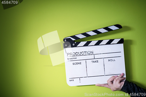 Image of movie clapper on green chroma background