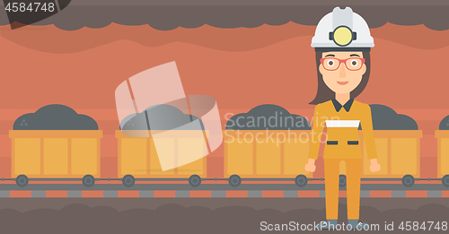 Image of Confident miner in hardhat.