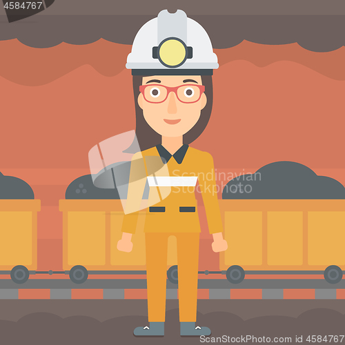 Image of Confident miner in hardhat.