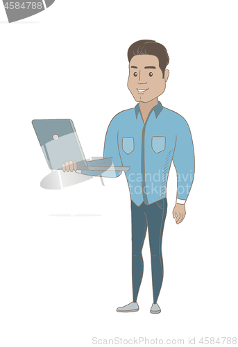 Image of Young hispanic businessman using a laptop.