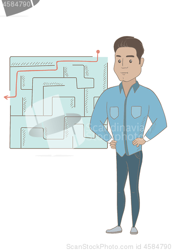 Image of Businessman looking at labyrinth with solution.