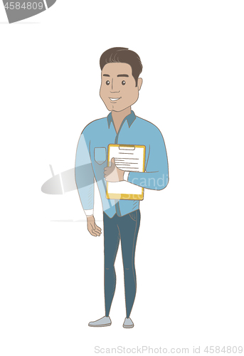 Image of Hispanic businessman holding clipboard with papers