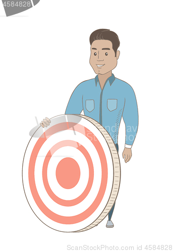 Image of Young hispanic businessman and dart board.