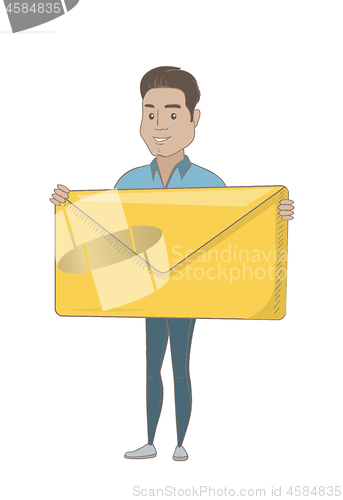 Image of Young hispanic businessman holding big envelope.