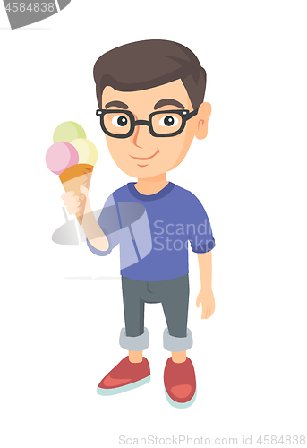 Image of Little caucasian boy holding an ice cream cone.