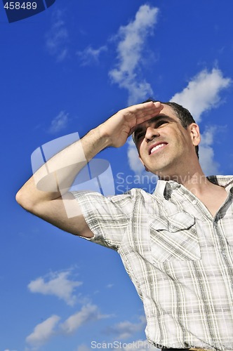 Image of Happy man looking into distance