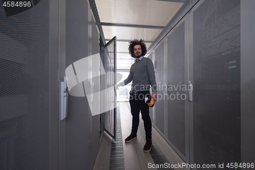 Image of technician using digital cable analyzer