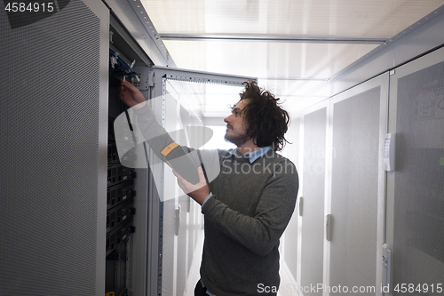 Image of technician using digital cable analyzer