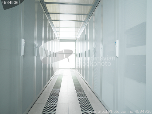 Image of modern server room with white servers