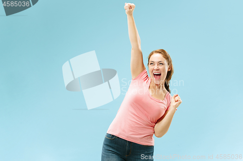 Image of Winning success woman happy ecstatic celebrating being a winner. Dynamic energetic image of female model