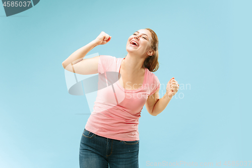 Image of Winning success woman happy ecstatic celebrating being a winner. Dynamic energetic image of female model