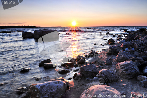 Image of Sunset over water