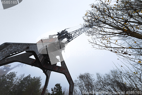 Image of Rusty old industrial dock cranes at the Dock