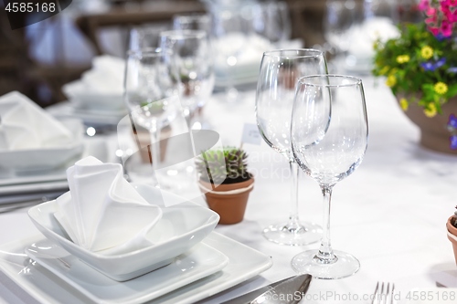 Image of Plates and dishes on dining table