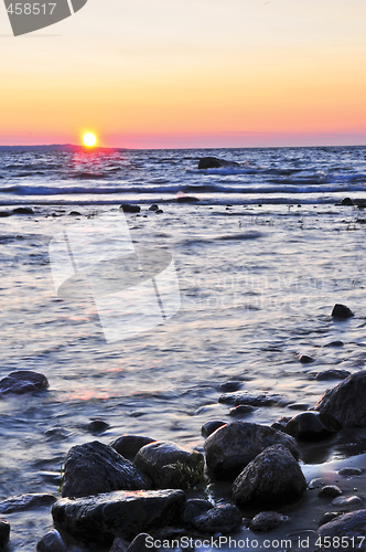 Image of Sunset over water