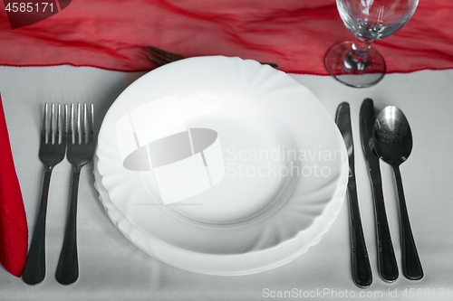 Image of Plates and dishes on dining table