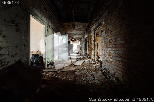 Image of Abandoned corridor in damaged building