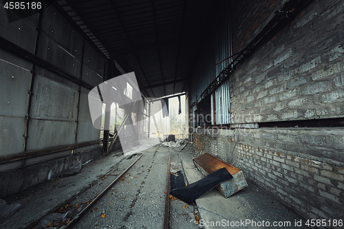 Image of Abandoned industrial hallway angle shot