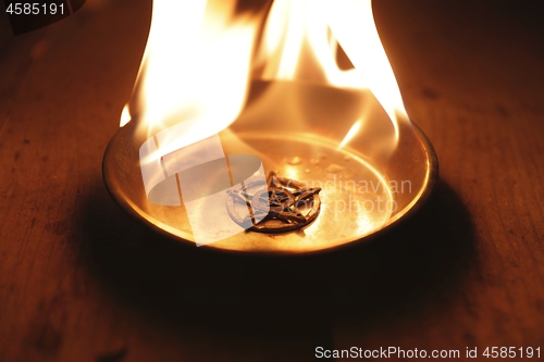 Image of Old pentagram burning in flames