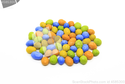 Image of Bright multicolored glazed chocolate candies on white