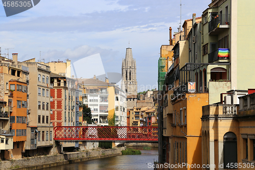 Image of Colorful houses and Eiffel bridge and river Onyar in Girona