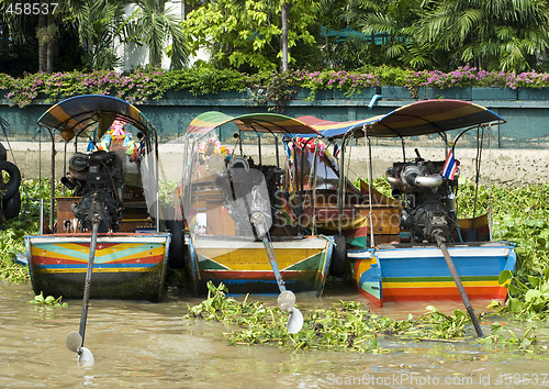 Image of Three longtail riverboats in Bangkok