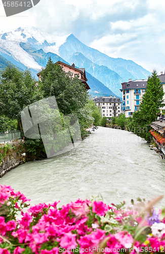 Image of Arve river, buildings of Chamonix and Mont Blanc Massif