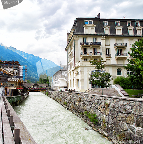 Image of Arve river, buildings of Chamonix and Mont Blanc Massif