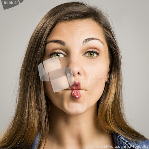 Image of Woman making pout