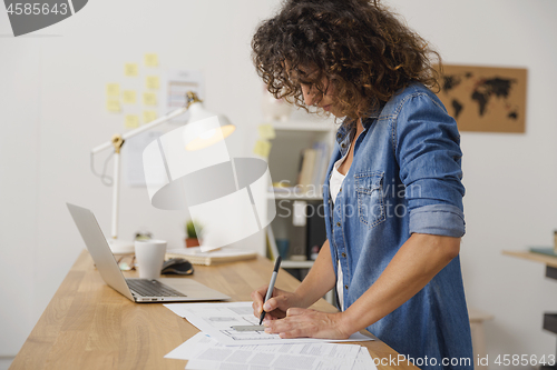 Image of Designer working on office