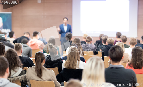 Image of Business speaker giving a talk at business conference event.