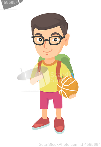 Image of Schoolboy with backpack holding a basketball.