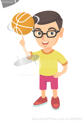 Image of Caucasian boy spinning basketball ball on finger.