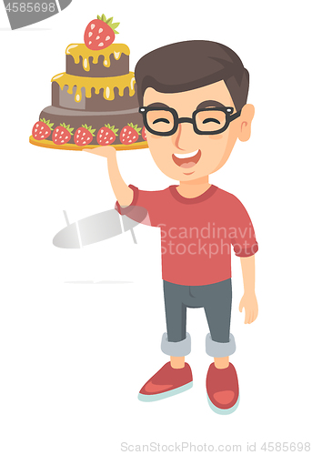 Image of Little caucasian boy holding a chocolate cake.