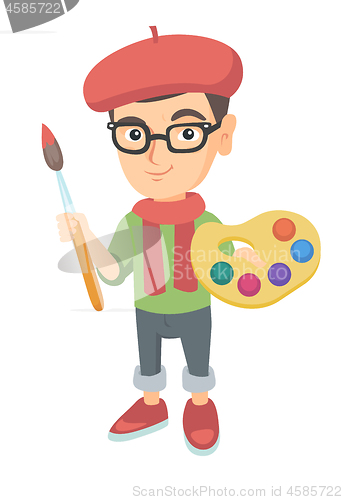Image of Boy dressed as an artist holding brush and paints.