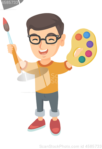 Image of Happy boy drawing with colorful paints and brush.