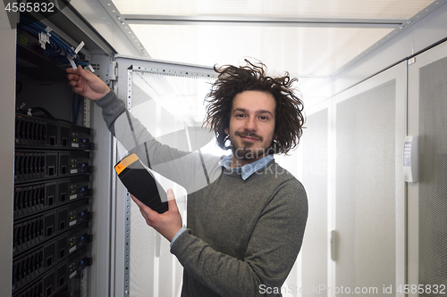 Image of technician using digital cable analyzer