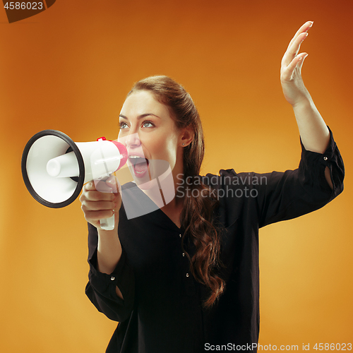 Image of Woman making announcement with megaphone