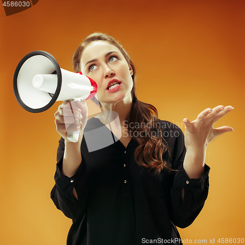 Image of Woman making announcement with megaphone