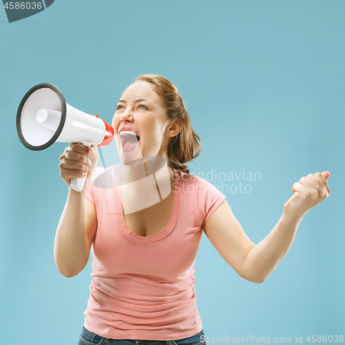 Image of Woman making announcement with megaphone