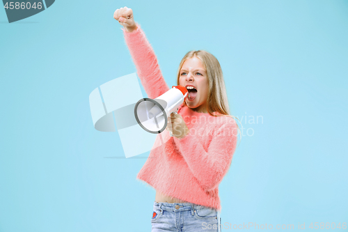 Image of The little girl making announcement with megaphone