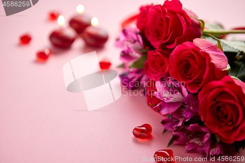 Image of Mixed flowers bouquet with roses, candles and heart shaped acrylic decorations