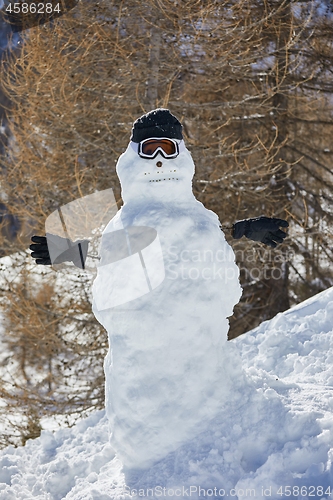 Image of Portrait of a snowman in the mountains