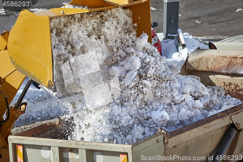 Image of Loader removing snow from street