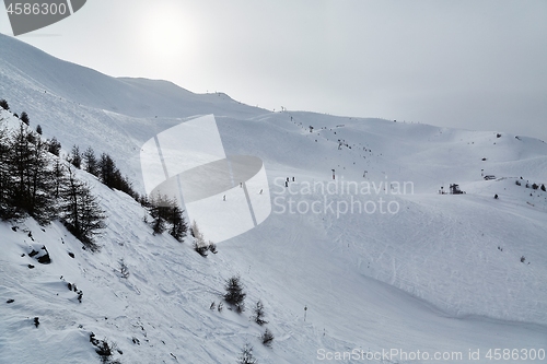 Image of Skiing slopes, snowy Alpine landscape